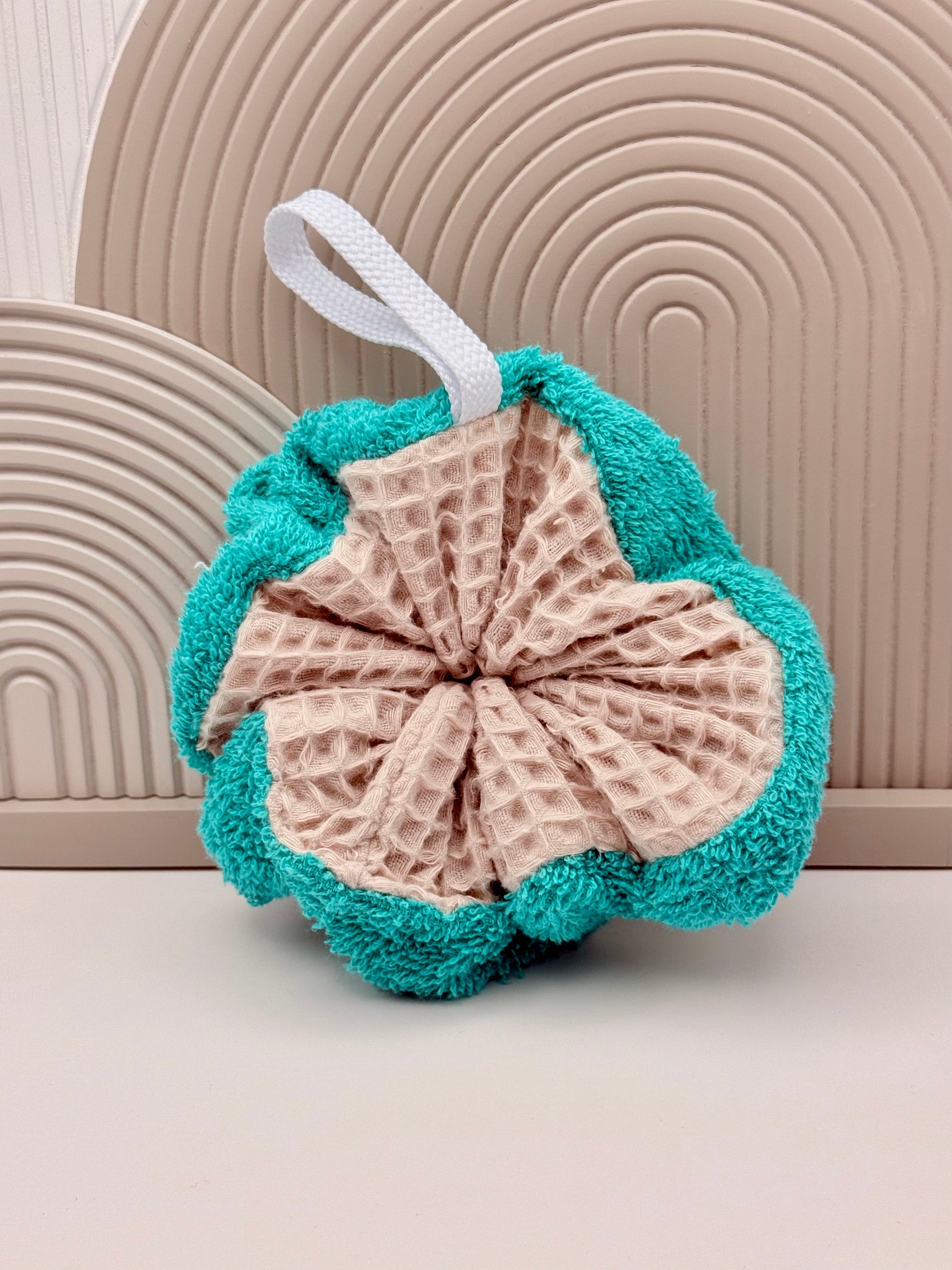 Fleur de douche éponge réutilisable turquoise